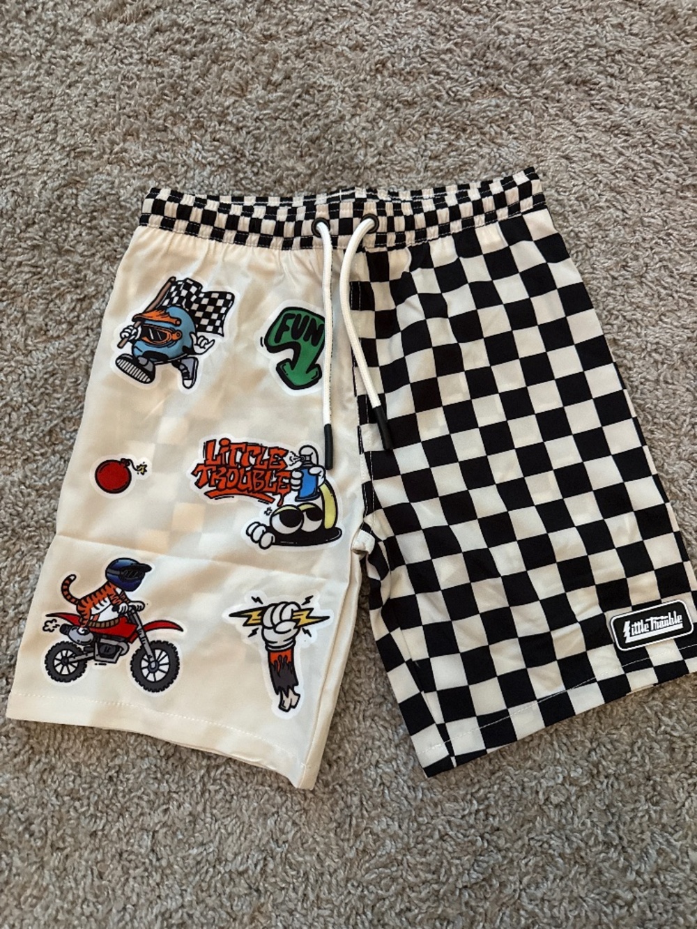 Little trouble sticker slab boardies